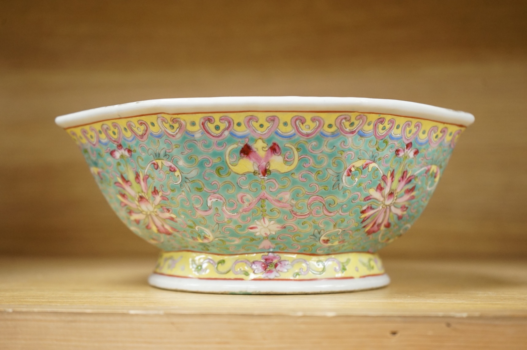 A Chinese enamelled porcelain turquoise ground hexagonal dish, Qianlong mark, late 19th century, 21cm in diameter